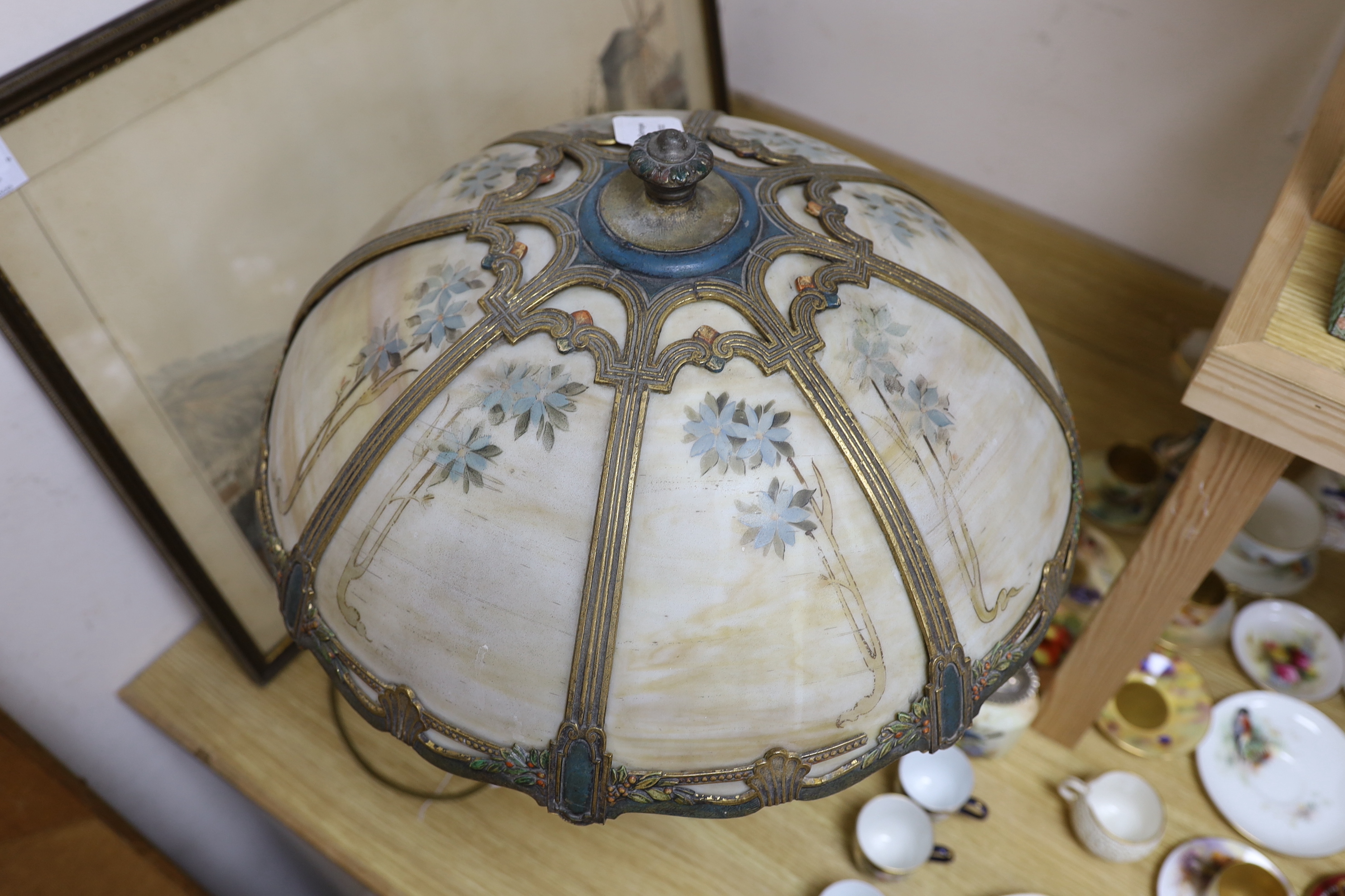 An early 20th century American ‘Miller & Co’ painted spelter and opaque glass table lamp, 55cms high